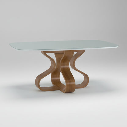 Mesa de jantar com tampo de vidro transparente e base em madeira clara, formato barril